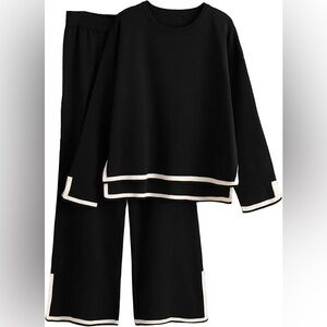 Black Knit pant suit with off white trim wide leg bottoms and long sleeves